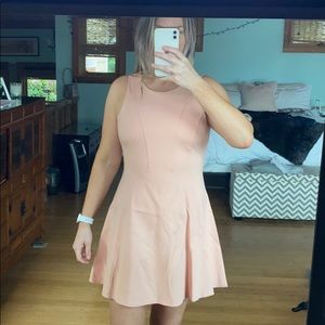 Pink sleeveless skater dress